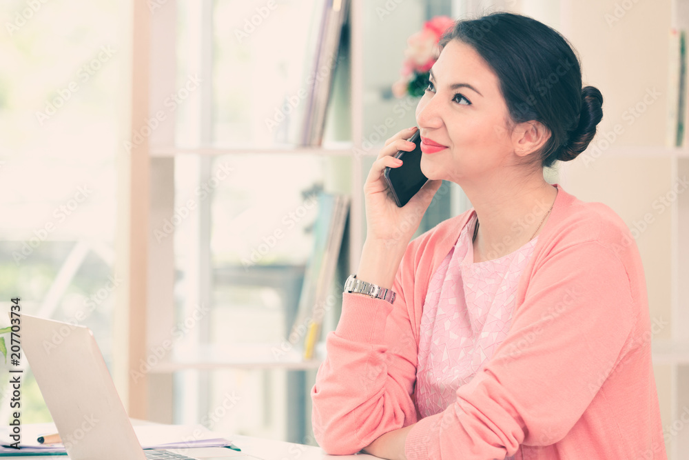 attractive businesswoman holding sitting working her small business from home attractive businesswoman holding sitting working her small business from home