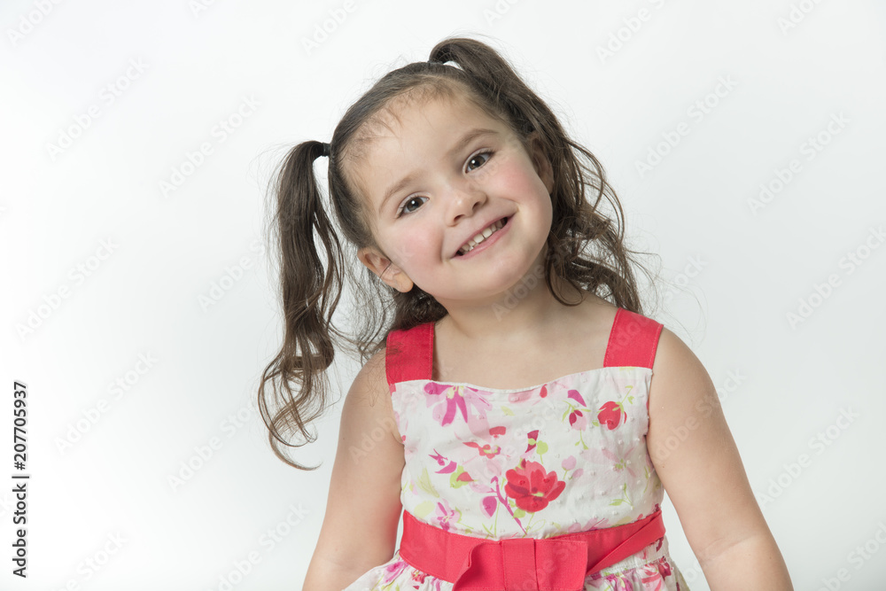 Happy, toddler girl with adorable smile, isolated on white background Happy, toddler girl with adorable smile, isolated on white background