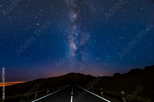 Night sky - a milky way over the road at night
