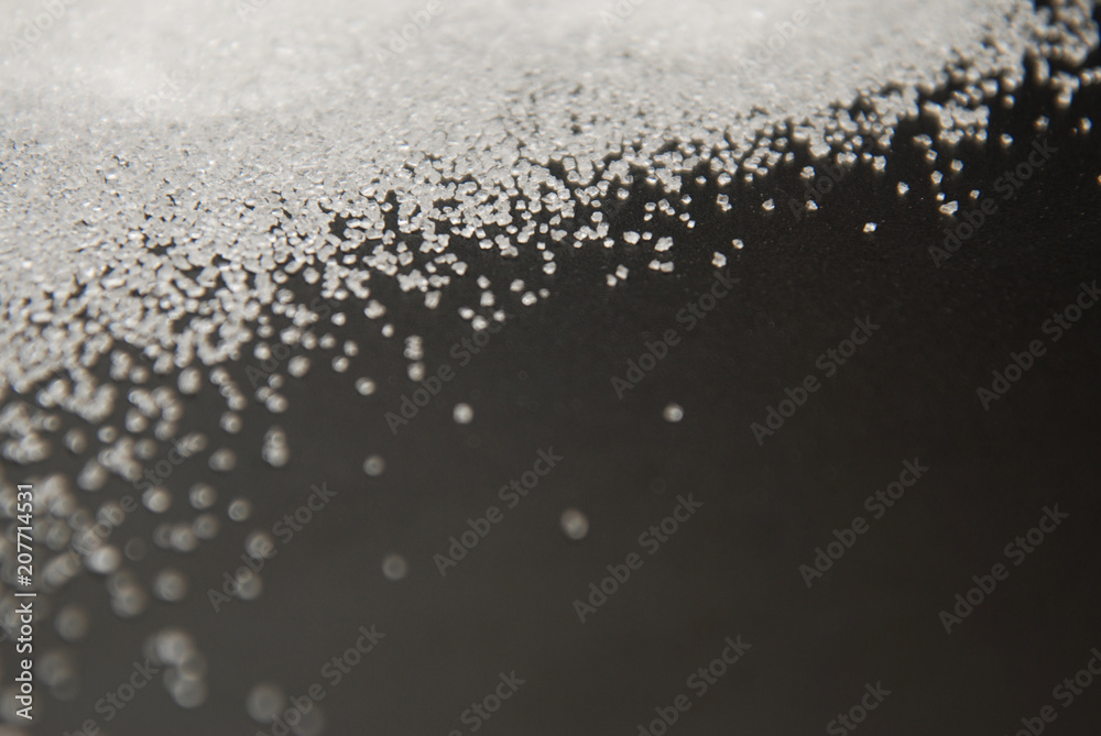 White Sweet Flour on Black Background - Free Space for text. Healthy, diet fitness concept. White Sweet Flour on Black Background - Free Space for text. Healthy, diet fitness concept.