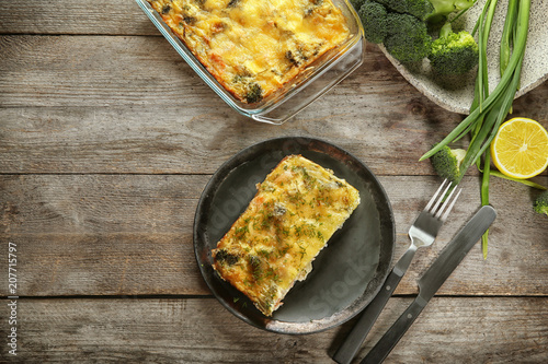 Tasty broccoli casserole on table. Fresh from oven