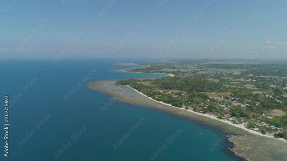 Aerial view of seashore with beaches, lagoons and coral reefs. Philippines, Luzon. Coast ocean with turquoise water. Tropical landscape in Asia. Aerial view of seashore with beaches, lagoons and coral reefs. Philippines, Luzon. Coast ocean with turquoise water. Tropical landscape in Asia.
