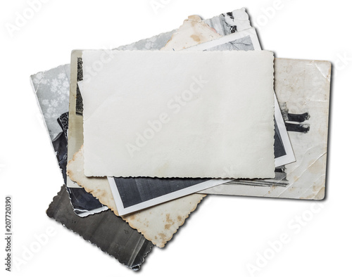 Stack of old photos. Isolated on white with clipping path included.