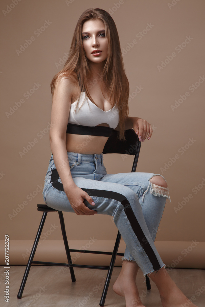 sexy fashion model with long hair, young European attractive, beautiful eyes, full lips, perfect skin is posing in studio for glamour vogue test photo shoot showing different poses. sexy fashion model with long hair, young European attractive, beautiful eyes, full lips, perfect skin is posing in studio for glamour vogue test photo shoot showing different poses.