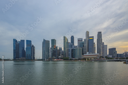 Sunset view of Singapore city skyline with Marina Bay © orpheus26
