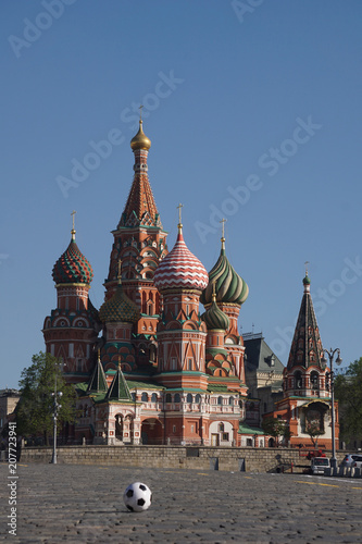 Moscow / Russia – 05.08.2018: vertical image of a soccer ball on the Red Square in Moscow in front of the Saint Basil's Cathedral