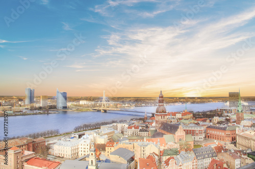 Beautiful view of the old town and the steeple of the Dome Cathedral near the Daugava River in Riga, Latvia