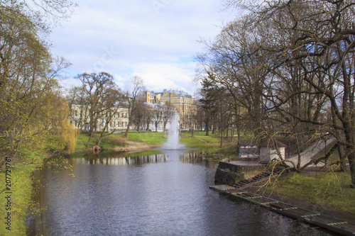 A beautiful view of the Riga Canal in Vermanes Garden, Riga, Latvia
