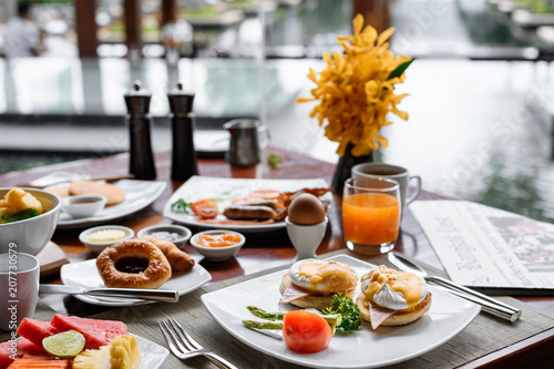 Setting of breakfast dishes in hotel restaurant © 9mot