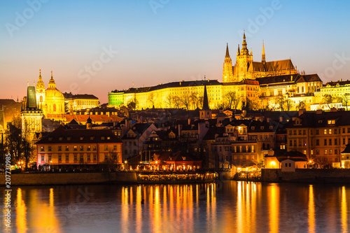 View of Charles Bridge, Prague Castle and Vltava river in Prague, Czech Republic during sunset time. World famous landmarks in Europe.