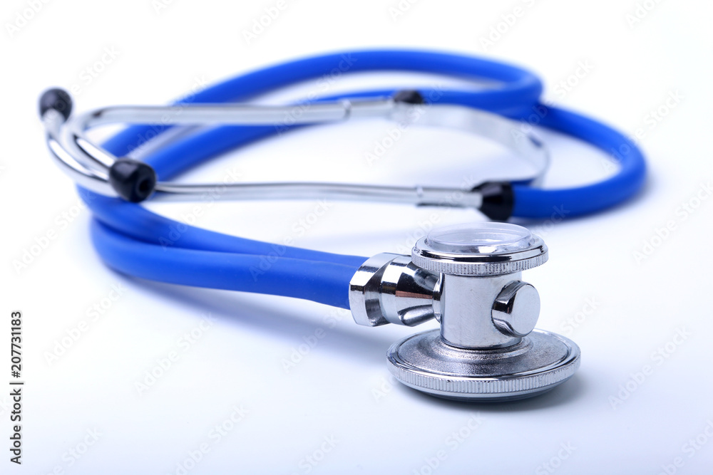 Medical stethoscope isolated on white. Closeup. Selective focus. Medical stethoscope isolated on white. Closeup. Selective focus.