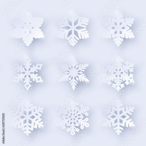 Vector set of 9 paper cut snowflakes with shadow on white background. New year and Christmas design elements photo