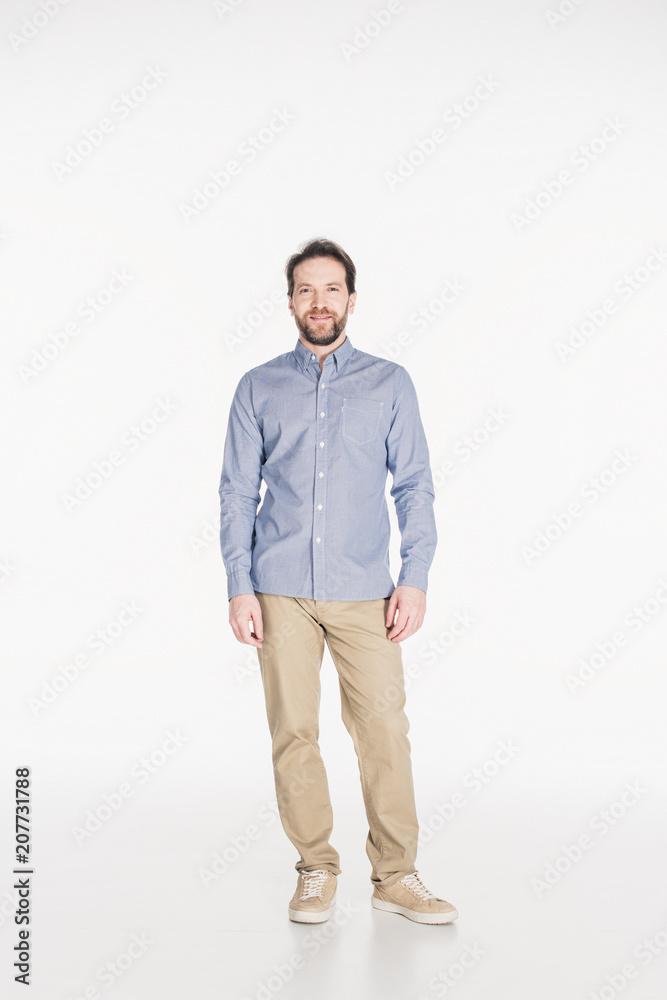 smiling bearded man in stylish clothing looking at camera isolated on white smiling bearded man in stylish clothing looking at camera isolated on white