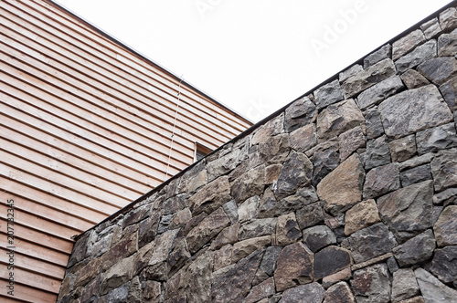 Civic passive building of modern materials detail  Symbol of modern buildup of wood and wood