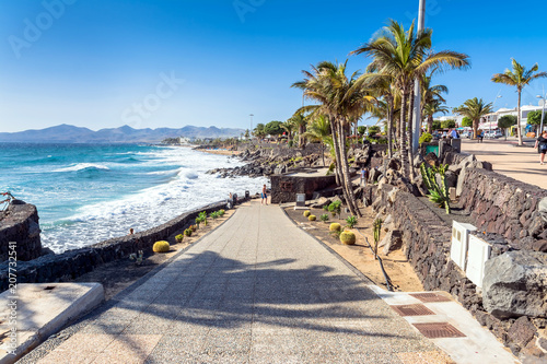 boardwalk and beach in Puerto del Carmen, Lanzarote, Spain