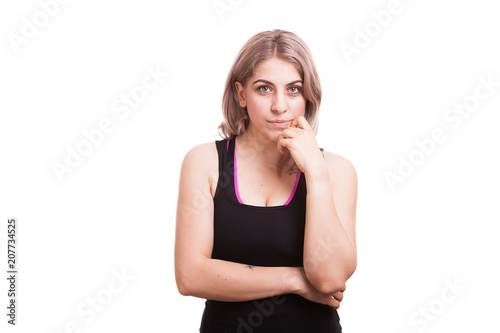 Cute woman in sport clothes isolated over white background in studio photo © DC Studio