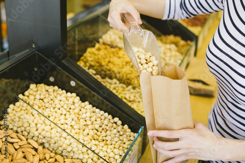 Nuts in the box. Non-packaged Nuts in the supermarket. photo