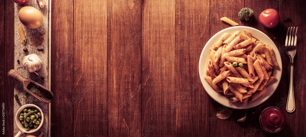 Fototapeta premium ready pasta on wood