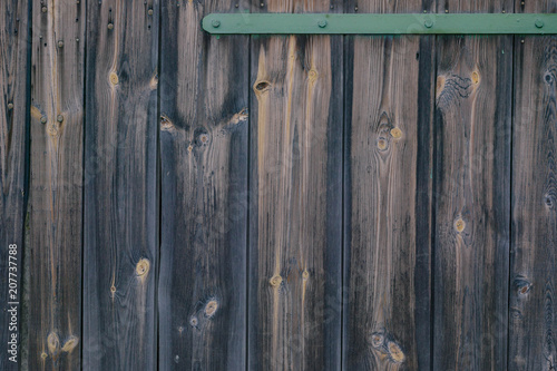 Vertical texture of old wooden planks. Rustic background