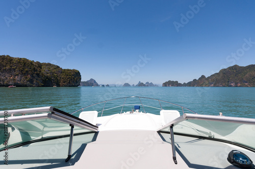 Cruising on a motorboat through the limestone islands of Phang Nga Bay  Phuket  Thailand