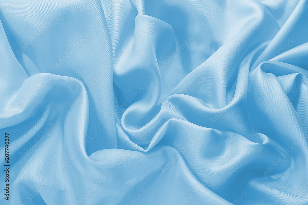 Obraz premium smooth folds of satin. silk fabric. wedding background.