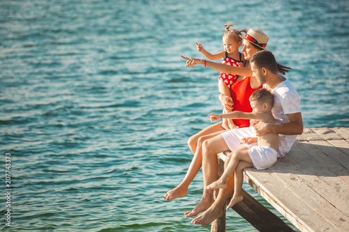 Cheerful family on the beach. Family on vacation