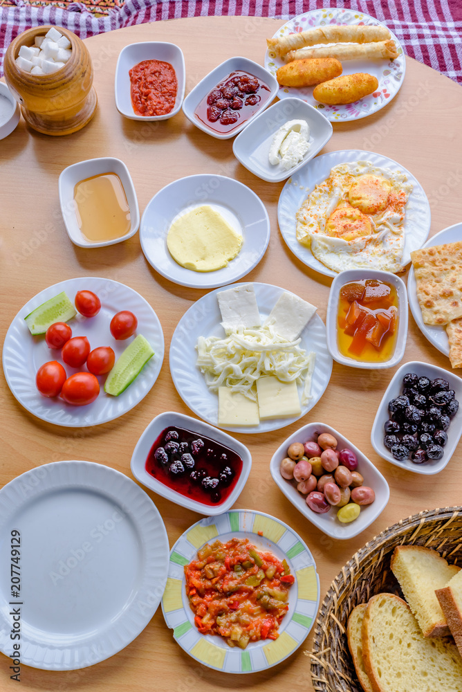 Top view of traditional Turkish breakfast on wooden table Top view of traditional Turkish breakfast on wooden table