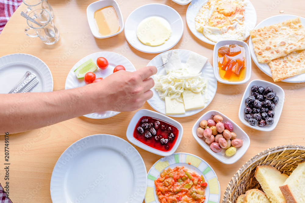 Top view of traditional Turkish breakfast on wooden table Top view of traditional Turkish breakfast on wooden table