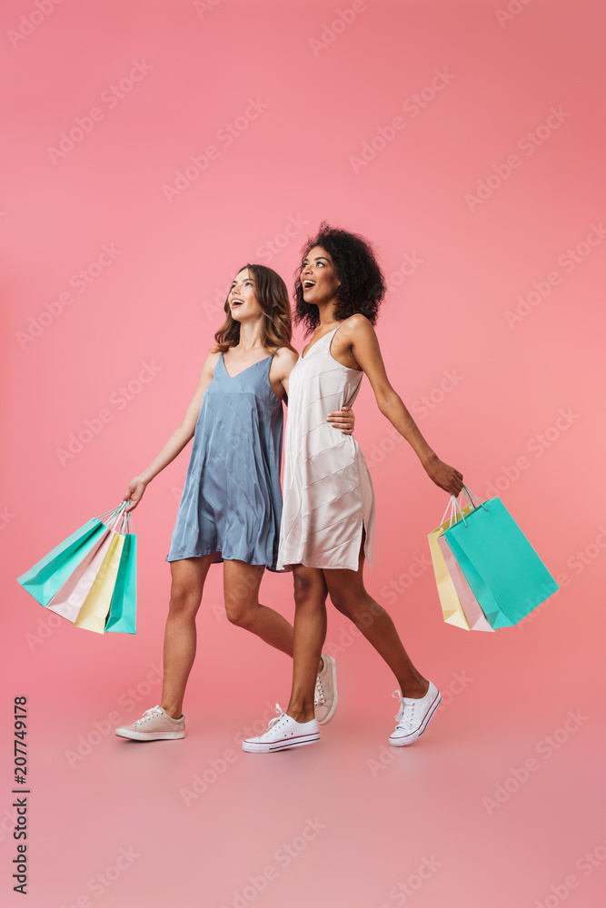 Full length portrait of two smiling young girls Full length portrait of two smiling young girls
