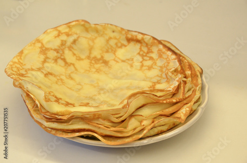 Blini. Tasty Russian pancakes on white table. Close up