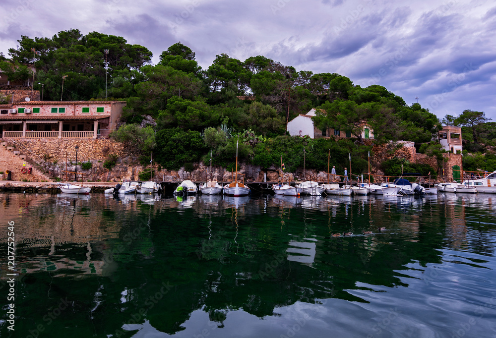 Picturesque small harbor in the south of Mallorca, Balearic islands, Spain. Mediterranean seascape.