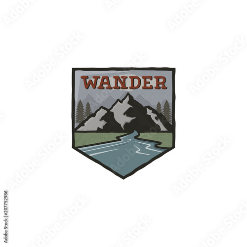 Mountain vintage badge. Mountain explorer label. Outdoor adventure logo design with mountains and wander sign. Travel and hipster insignia. Wilderness, forest camping emblem. Stock 