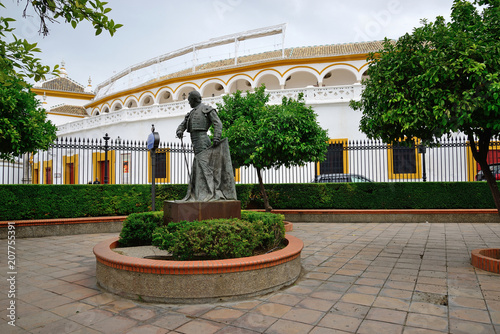 Seville, Spain - May 25, 2018: Statue and monument to the Torero Curro Romero, Sevilla. photo