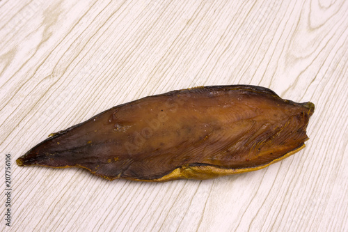 pieces smoked fish on a white background .