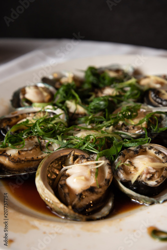 Photography Steamed abalone dish at a chinese restaurant a very popular dish at asian weddin