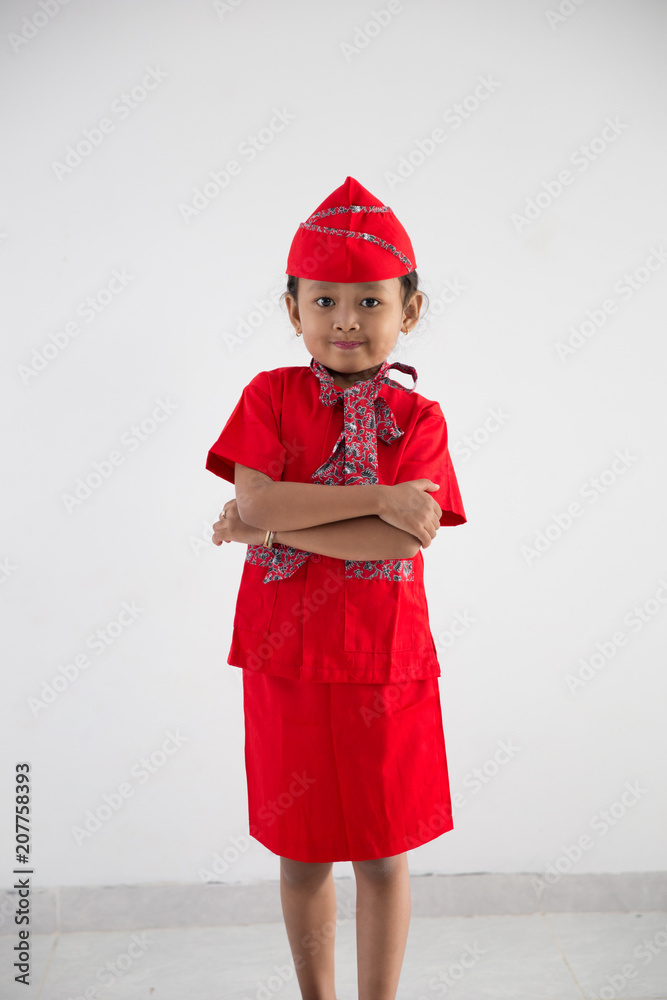 Obraz premium kid with flight attendant stewardess uniform