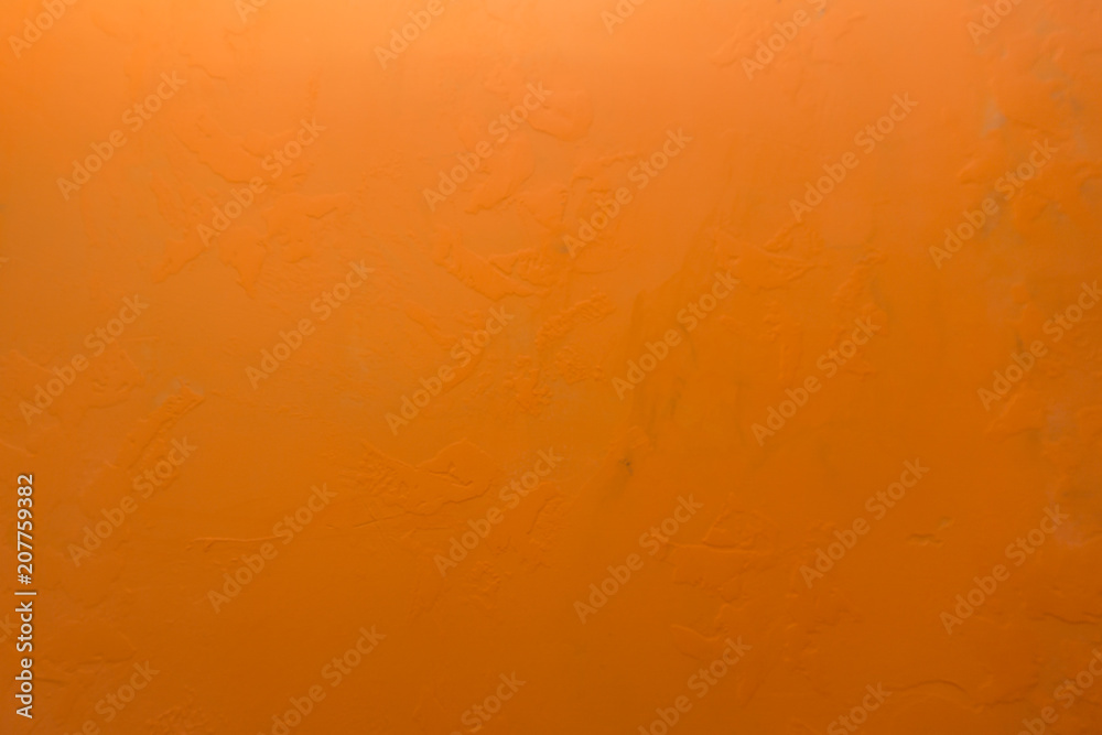 Obraz premium Cement orange wall background weathered wrinkled yellow .