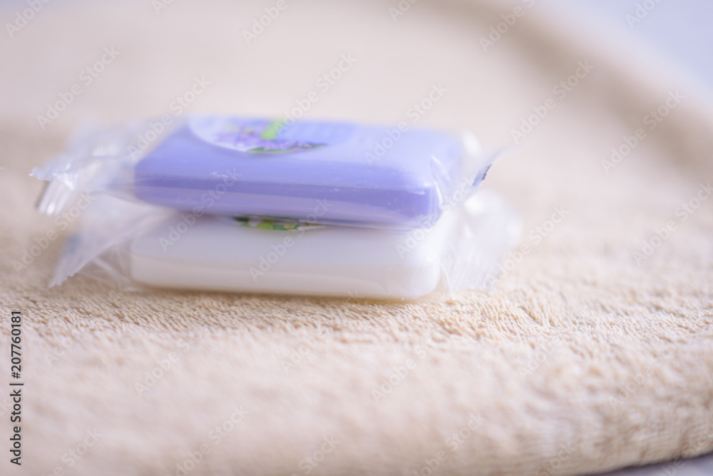 Two bars of soap in a transparent package Two bars of soap in a transparent package