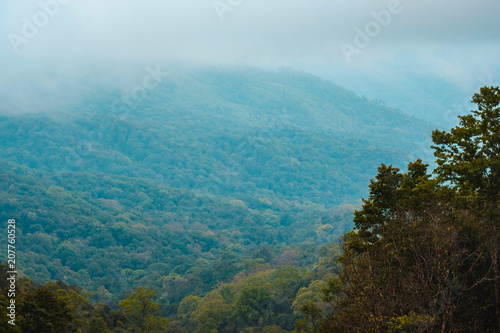 high mountains peaks range clouds in fog scenery landscape national park view outdoor  at Chiang Rai  Chiang Mai Province  Thailand