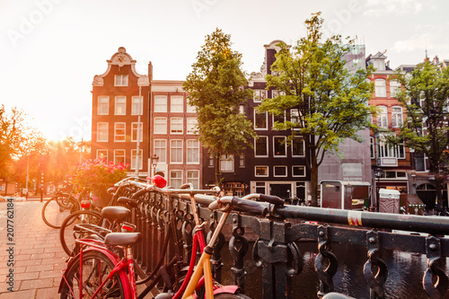 sunrise on the streets and canals of amsterdam