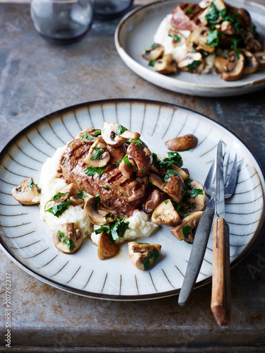 Fillet steak with mushrooms and cauliflower and horseradish mash, close-up photo