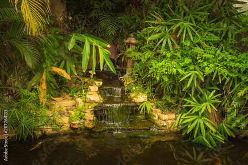 Mysterious waterfall in decorative pond