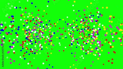 Multicolored particles confetti on green screen, seamless loop 3D animation.