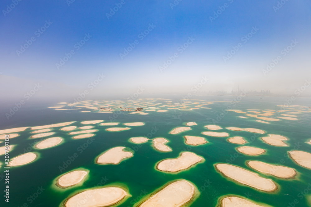Naklejka premium Aerial view of artificial World island in Dubai.