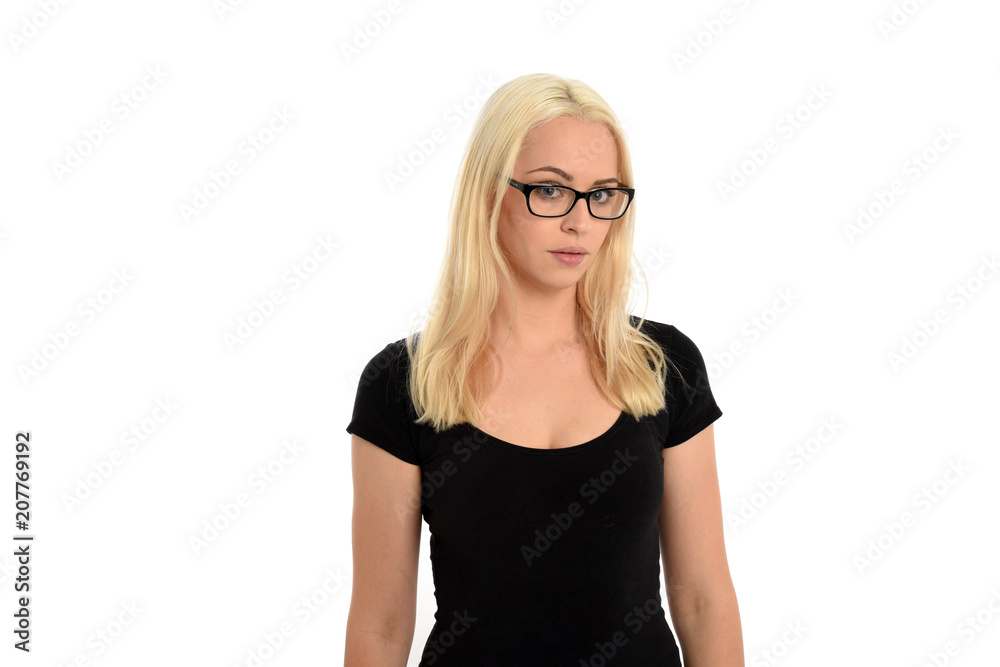 portrait of pretty blonde girl wearing glasses and black shirt. isolated on white background. portrait of pretty blonde girl wearing glasses and black shirt. isolated on white background.