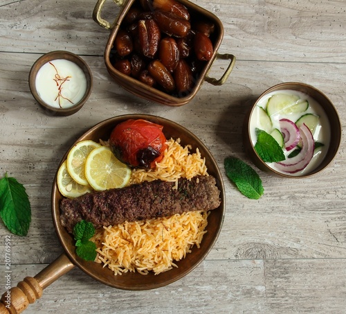 Persian Beef Kabab with Rice Dates salad / Ramadan Food photo