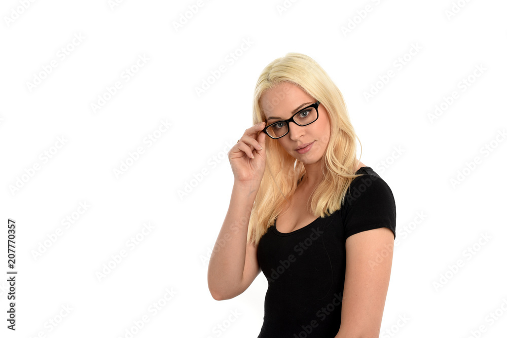 portrait of pretty blonde girl wearing glasses and black shirt. isolated on white background. portrait of pretty blonde girl wearing glasses and black shirt. isolated on white background.