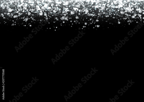 Silver glitter texture. Irregular confetti border on a black background. Christmas or party flyer design element. Vector illustration.