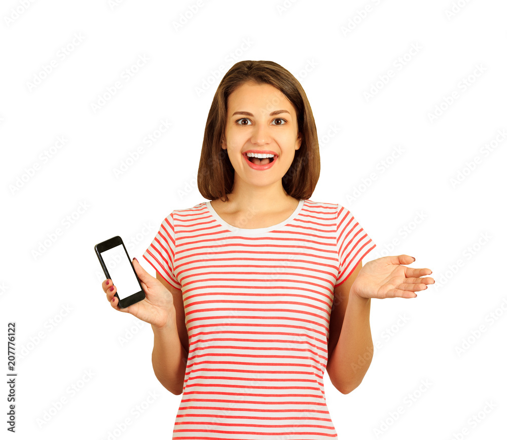 Surprised smiling young female blogger, got shocking good news in the social network on the mobile phone. emotional girl isolated on white background Surprised smiling young female blogger, got shocking good news in the social network on the mobile phone. emotional girl isolated on white background