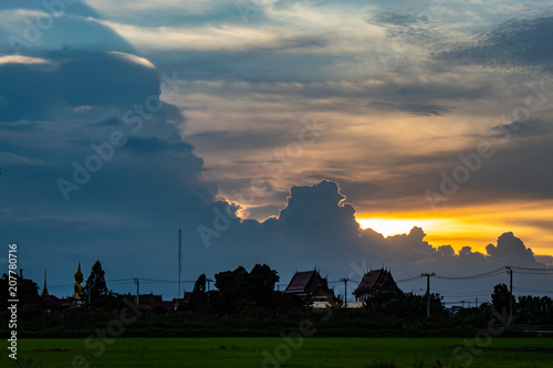 Sunset behind Wat Lad Pha Dook , Temple. photo